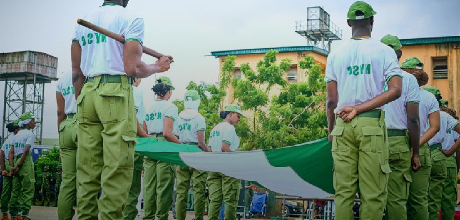 NYSC members holding flag